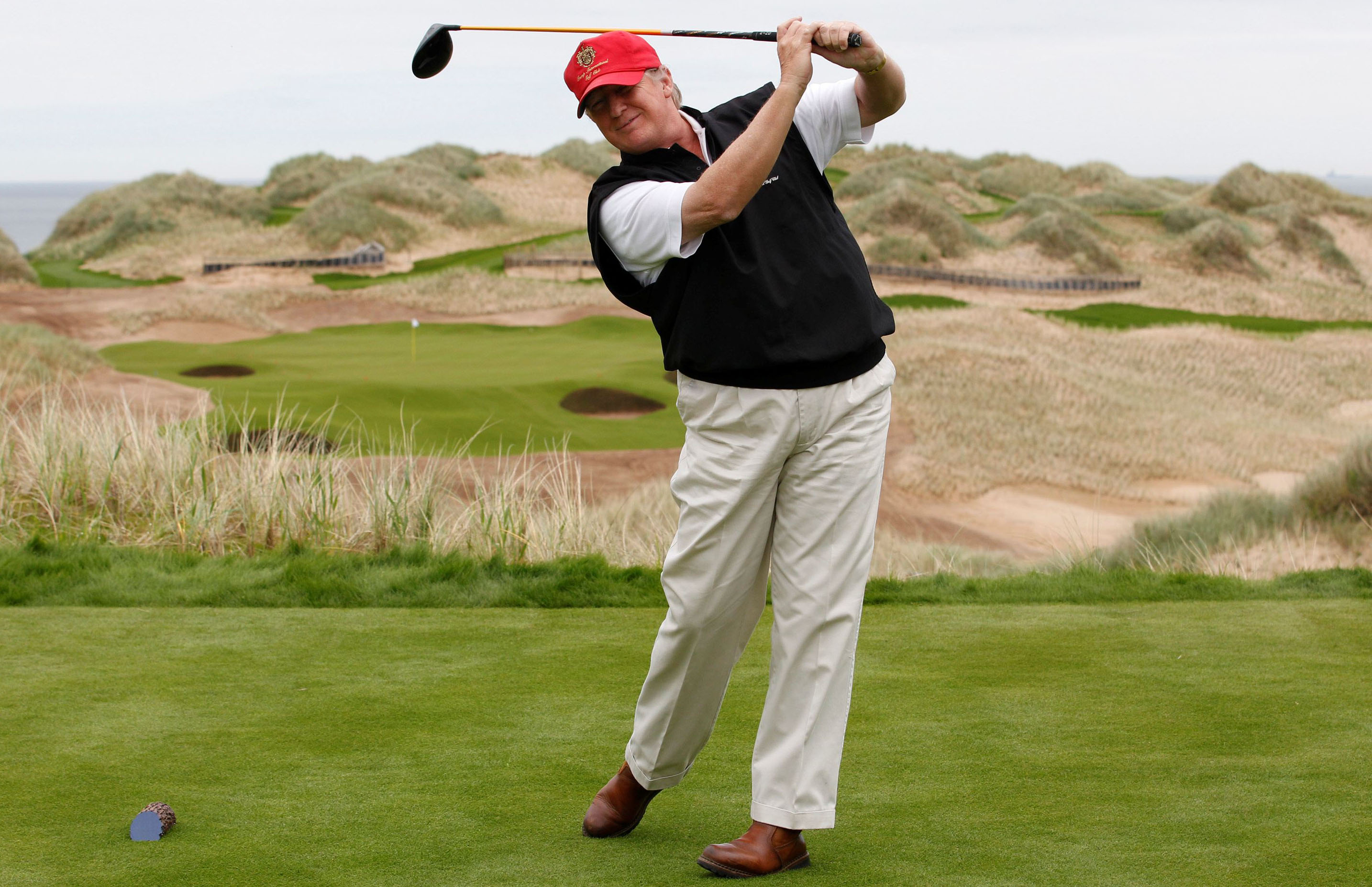 Photo: did trump play golf with bet founder